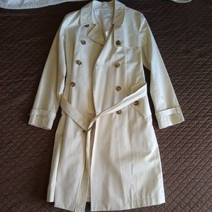 A Banana Republic Trench Coat with a tie belt.